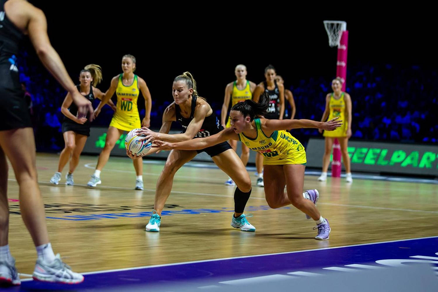 Teenage Girls Run Grabbing Ball Netball Sports