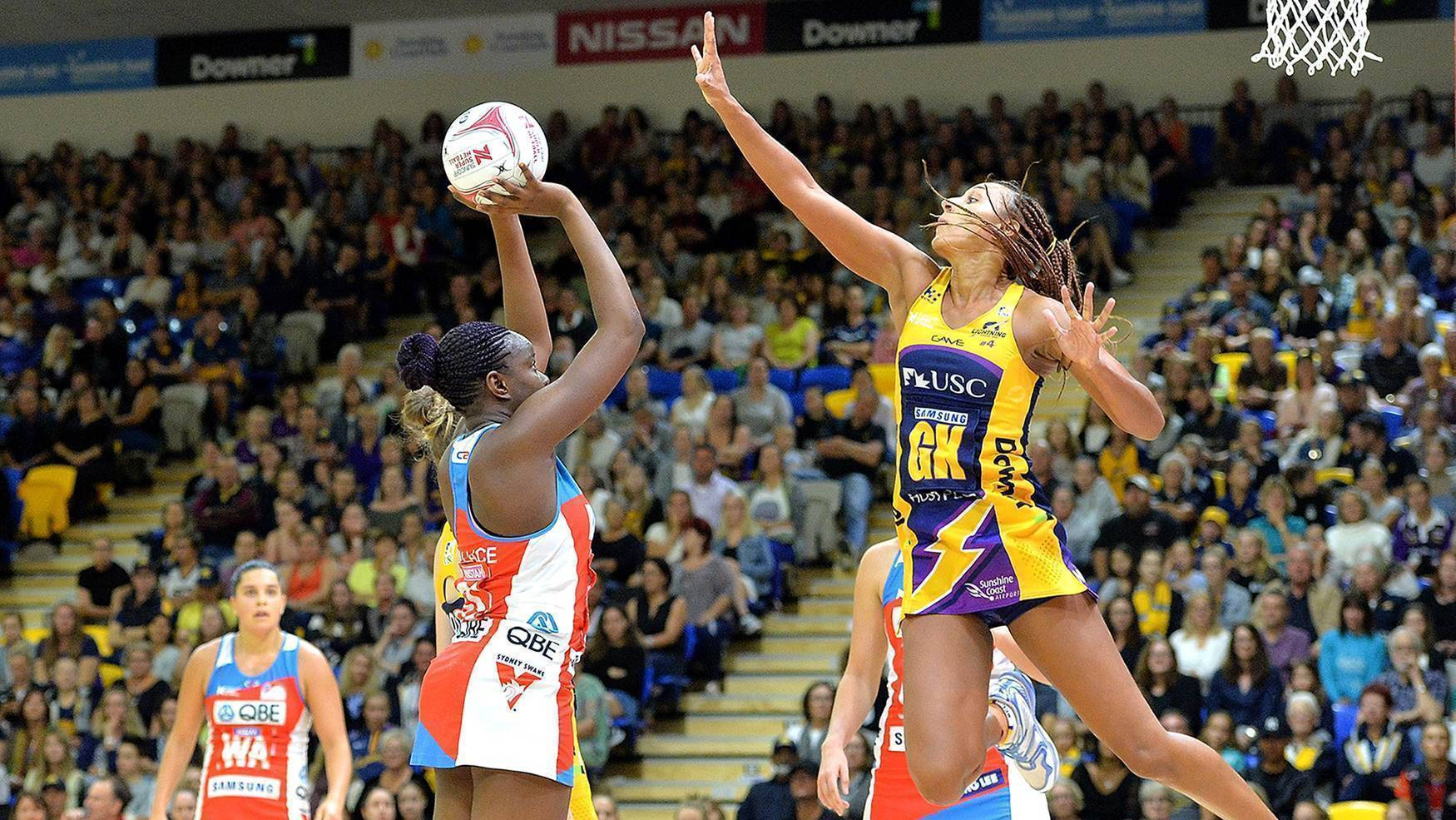 Teenage Girls Shoot Block Playing Netball