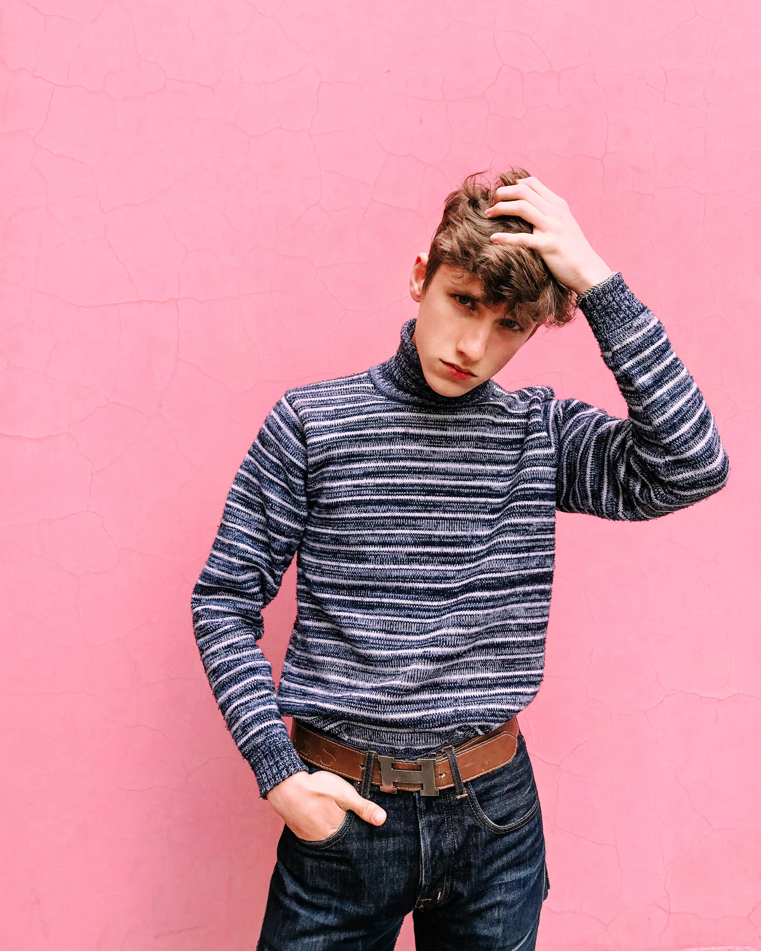 Teenage Model Guy In Stripes Background