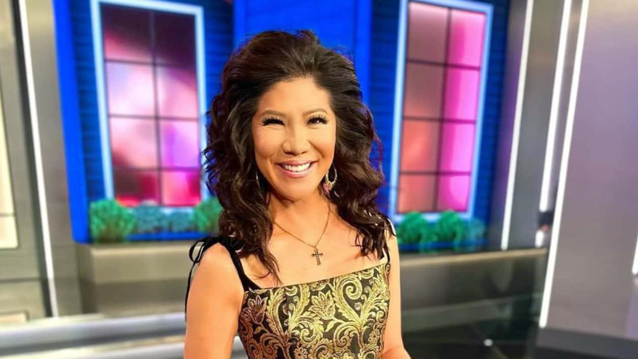 Television Host Smiling On Set.jpg Background