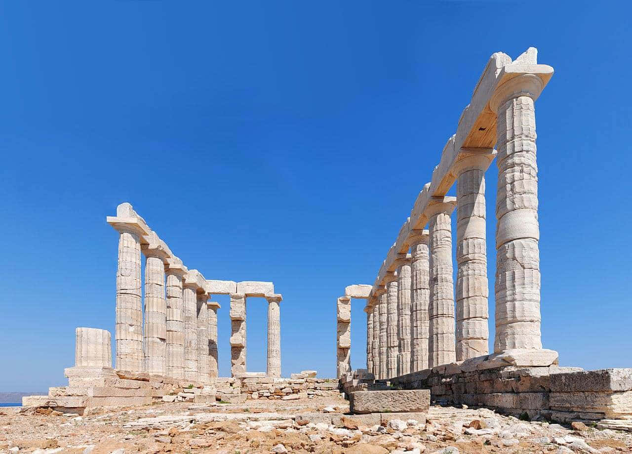 Temple Of Poseidon In Worm Eye View Background