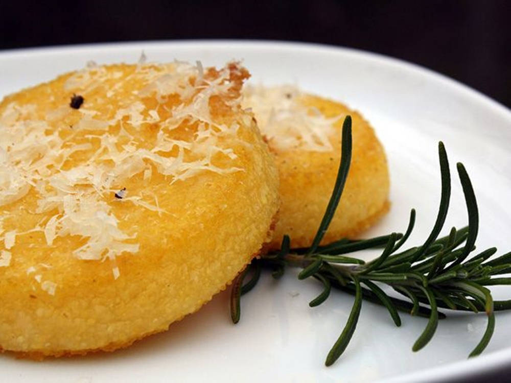 Temptingly Tasty Round Polenta Cakes Freshly Made. Background