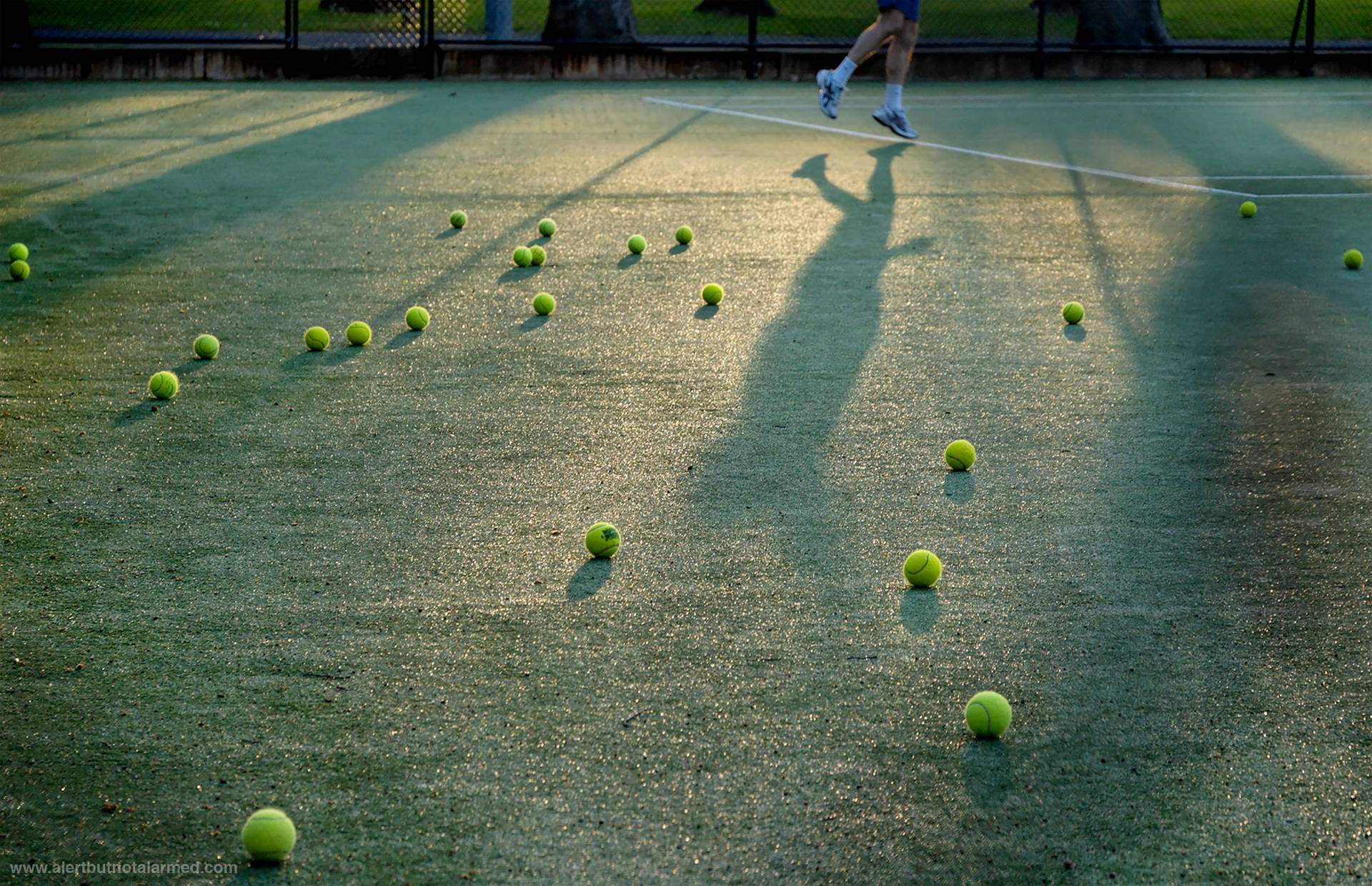 Tennis Balls On Court Background
