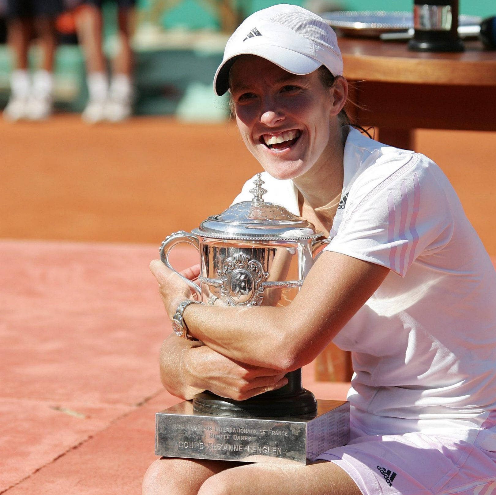 Tennis Champion - Justine Henin Playing At French Open Background