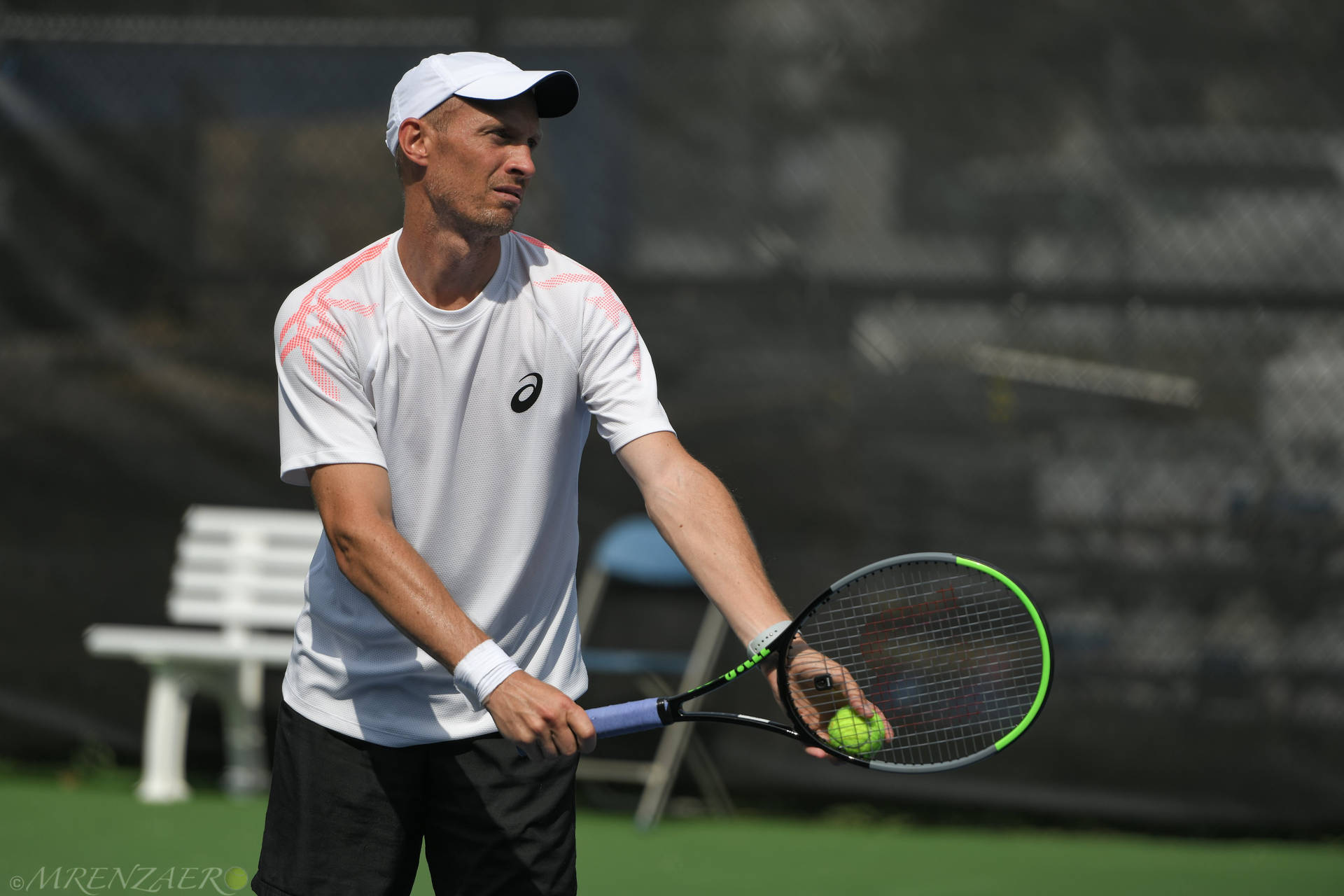 Tennis Champion Nikolay Davydenko Preparing For Serve Background