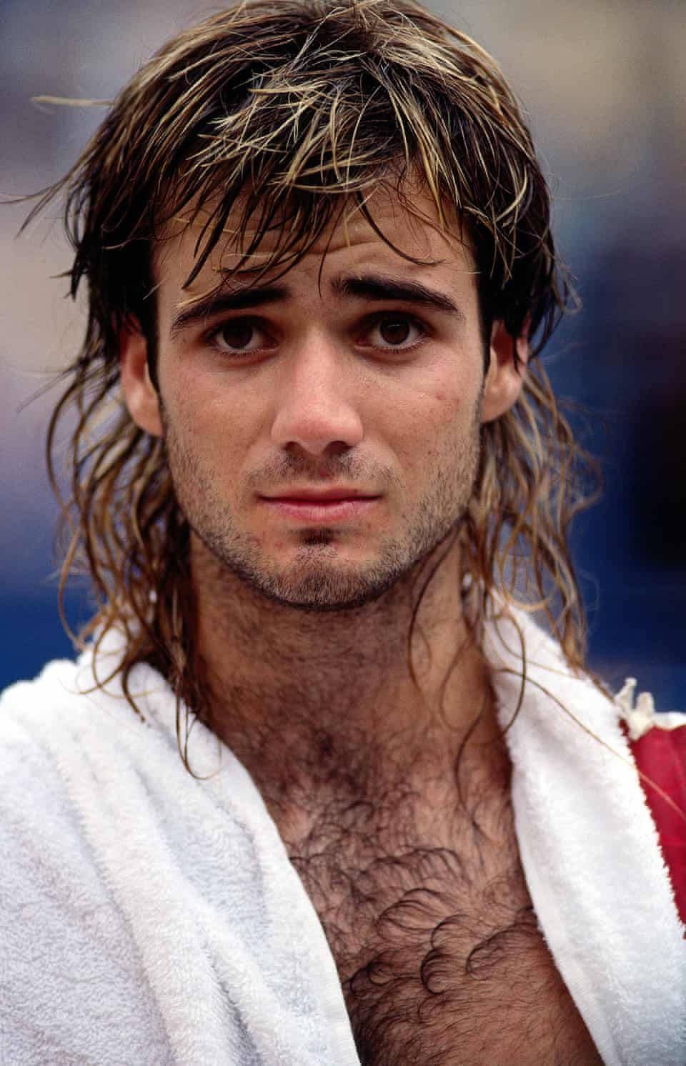 Tennis Legend Andre Agassi Sporting Long Wet Hair Background