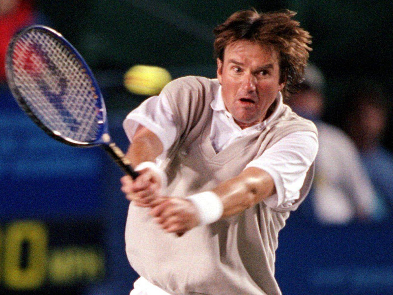 Tennis Legend Jimmy Connors In Action Background