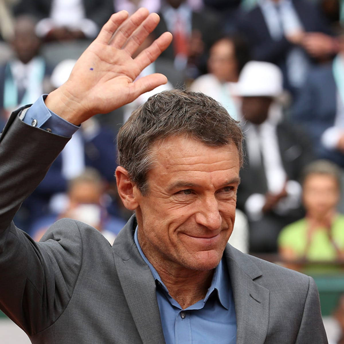 Tennis Legend Mats Wilander Waving To His Fans Background