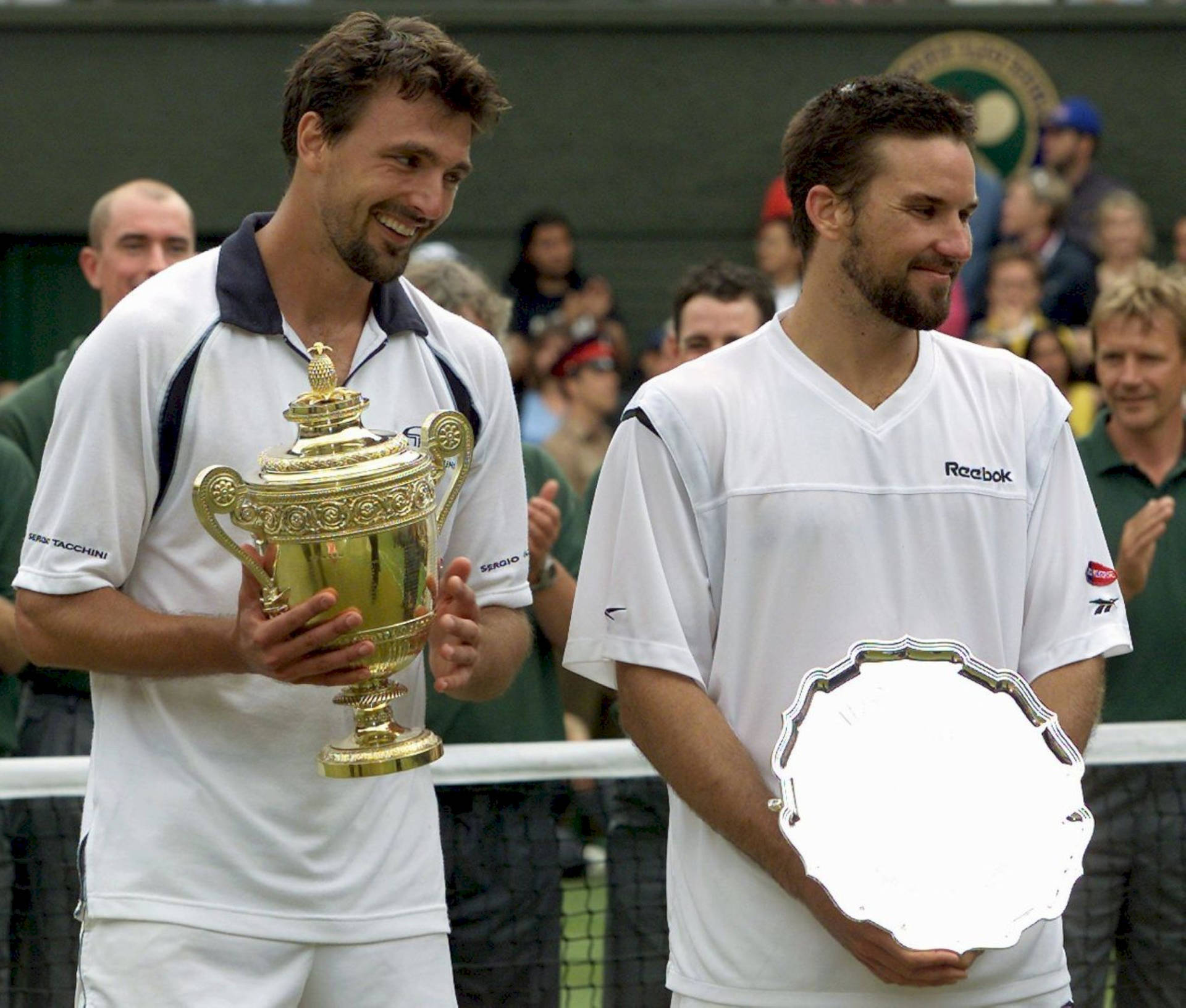 Tennis Legends Patrick Rafter And Goran Ivanisevic Sharing A Joyful Moment Background