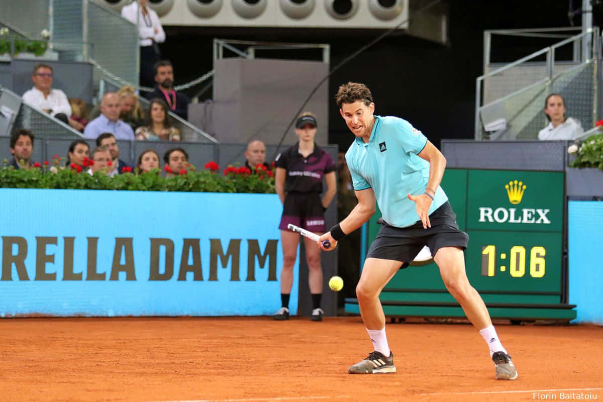 Tennis_ Player_ Backhand_ Shot_on_ Clay_ Court Background