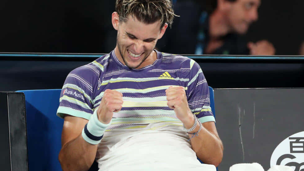 Tennis Player Celebrating Victory Background