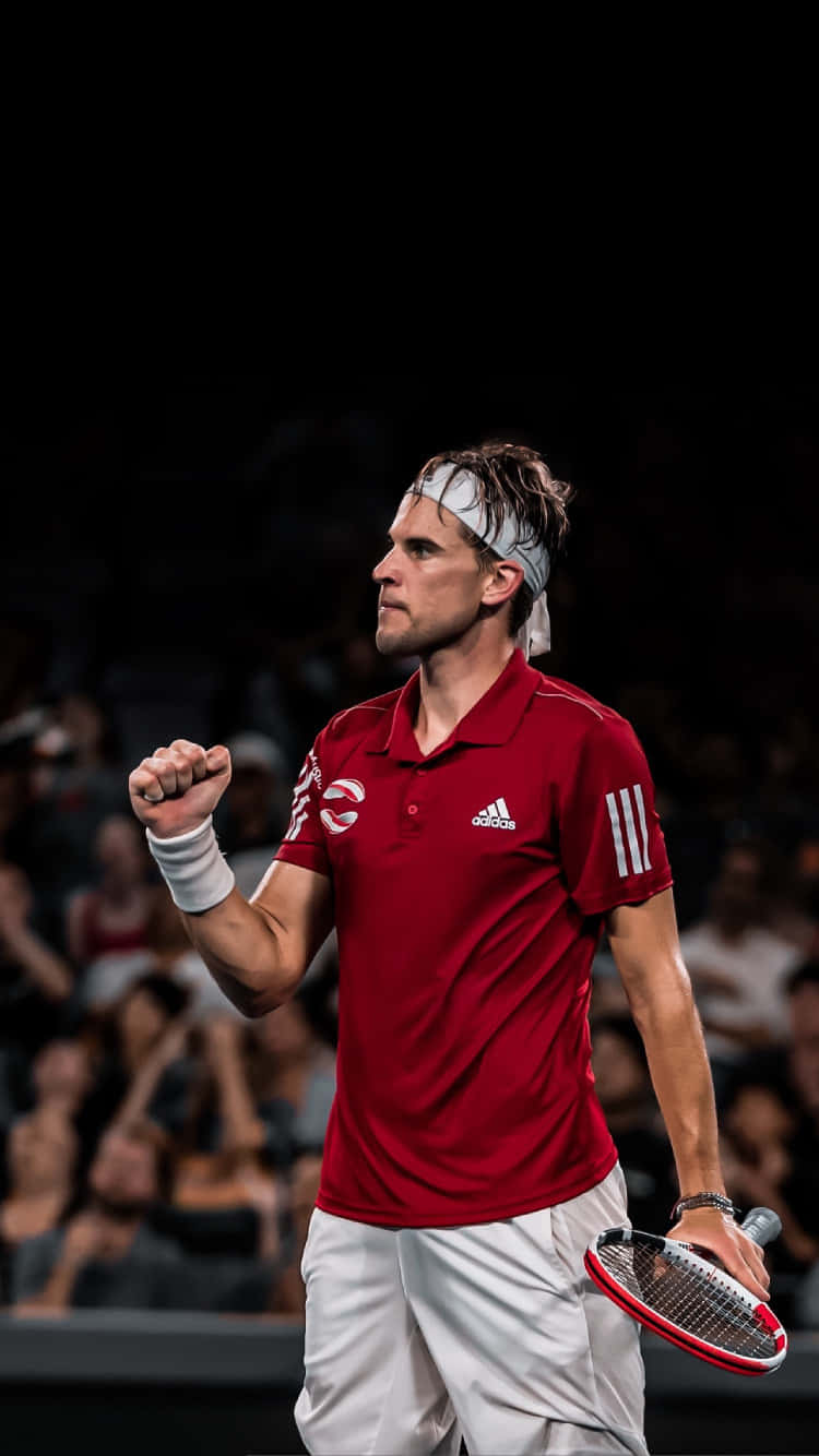 Tennis Player Celebrating Victory Background