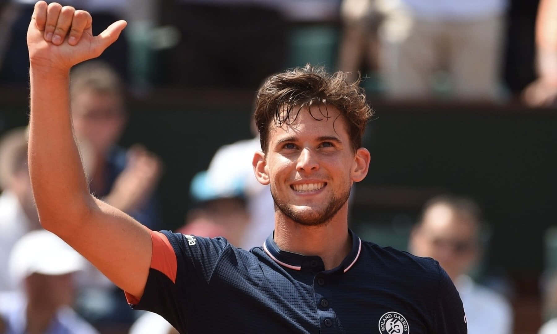 Tennis Player Celebrating Victory Background