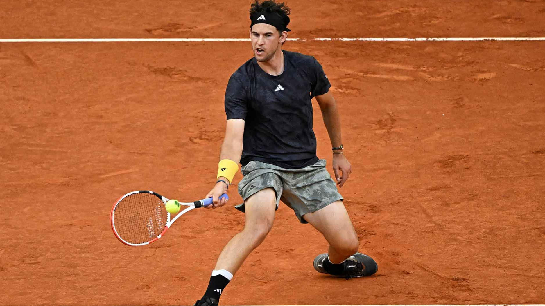 Tennis Player Intense Forehandon Clay Court Background