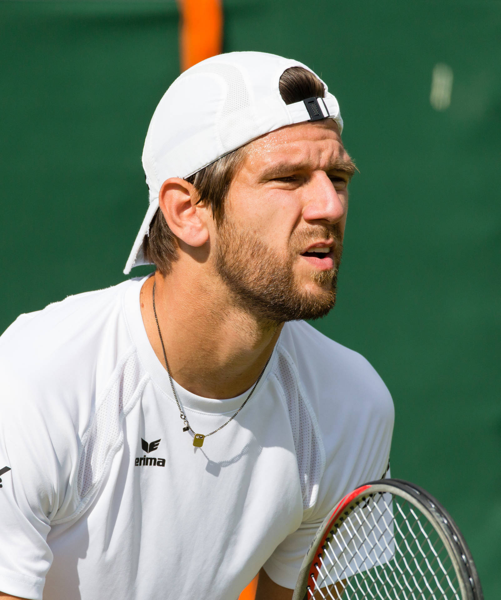 Tennis Player Jurgen Melzer Intensely Focused On The Court Background