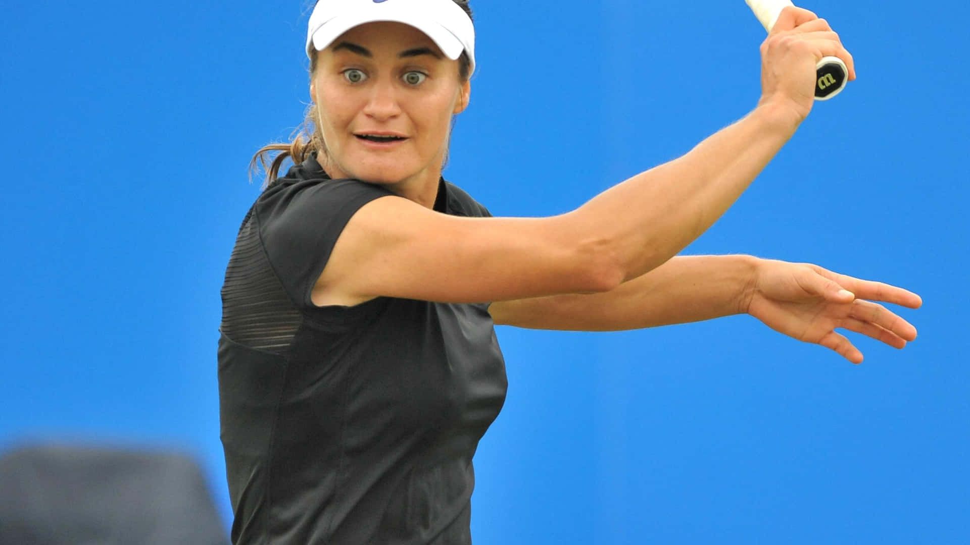 Tennis Player Monica Niculescu Looking Pleased Background