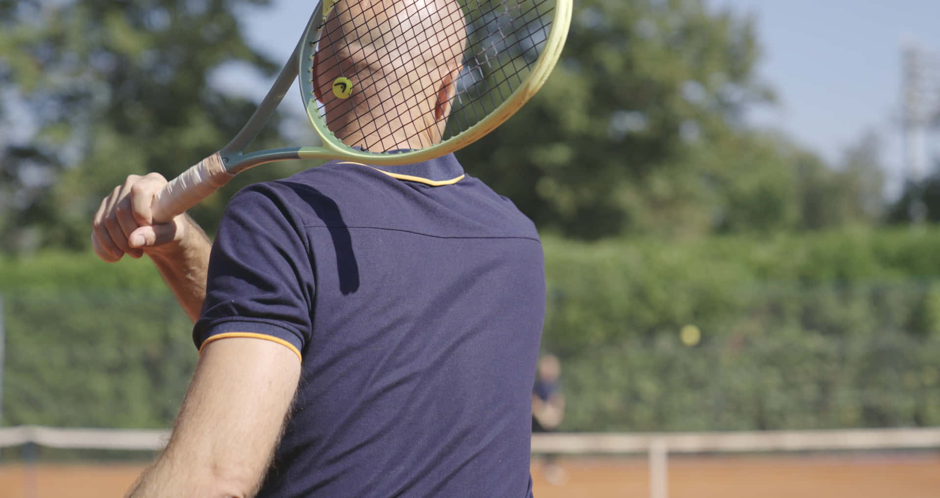 Tennis Player Preparingto Serve Background