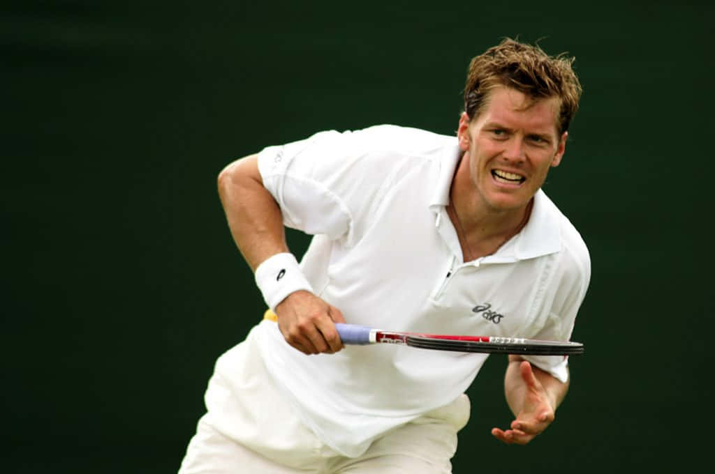 Tennis Player Thomas Enqvist Green Background