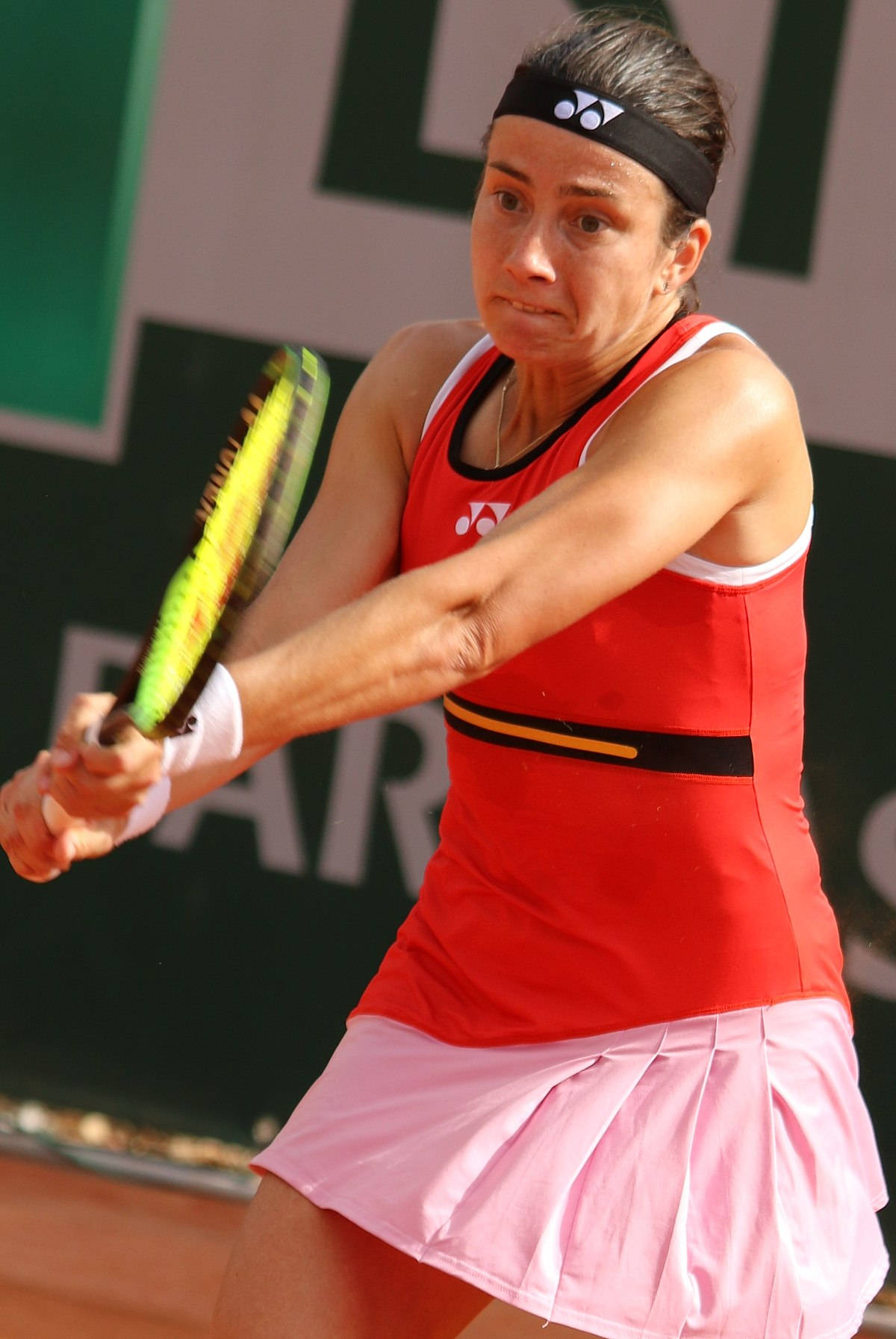 Tennis Star Anastasija Sevastova Holding Her Racket Ready On Court