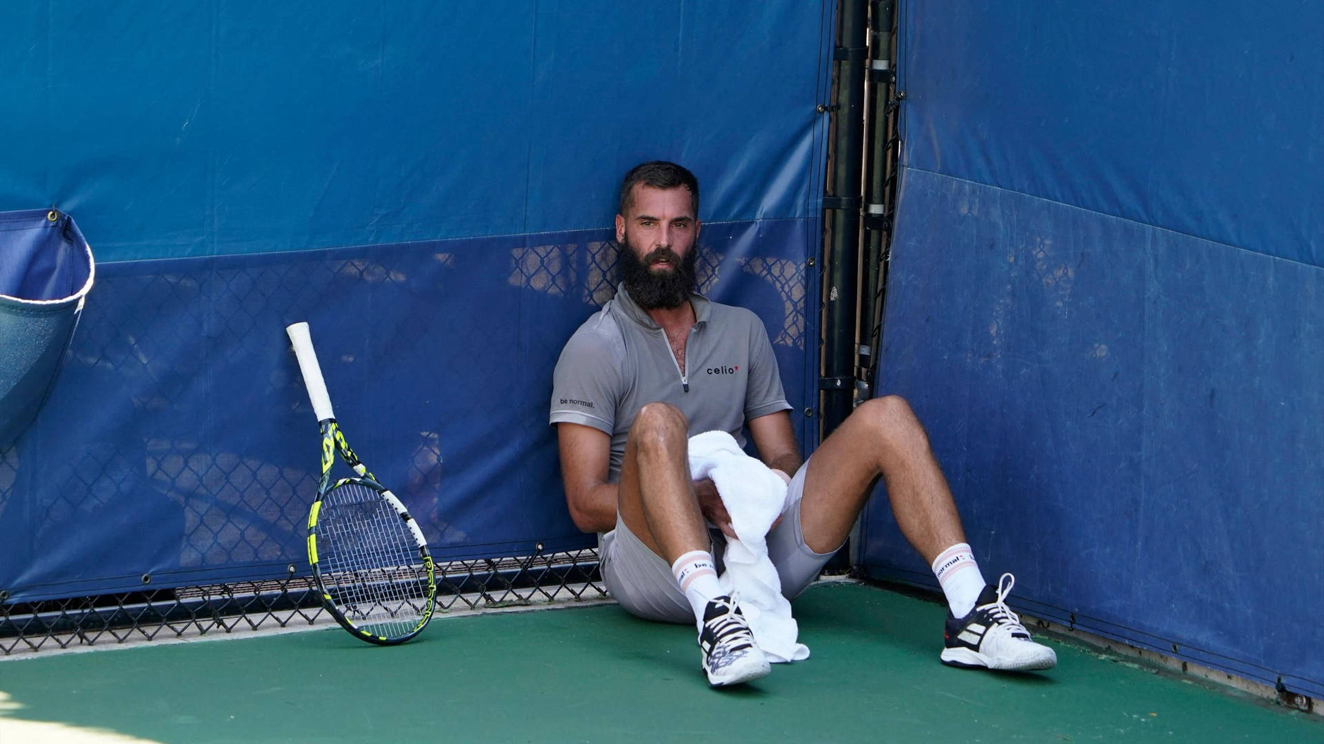 Tennis Star Benoit Paire Taking A Moment To Breathe Background