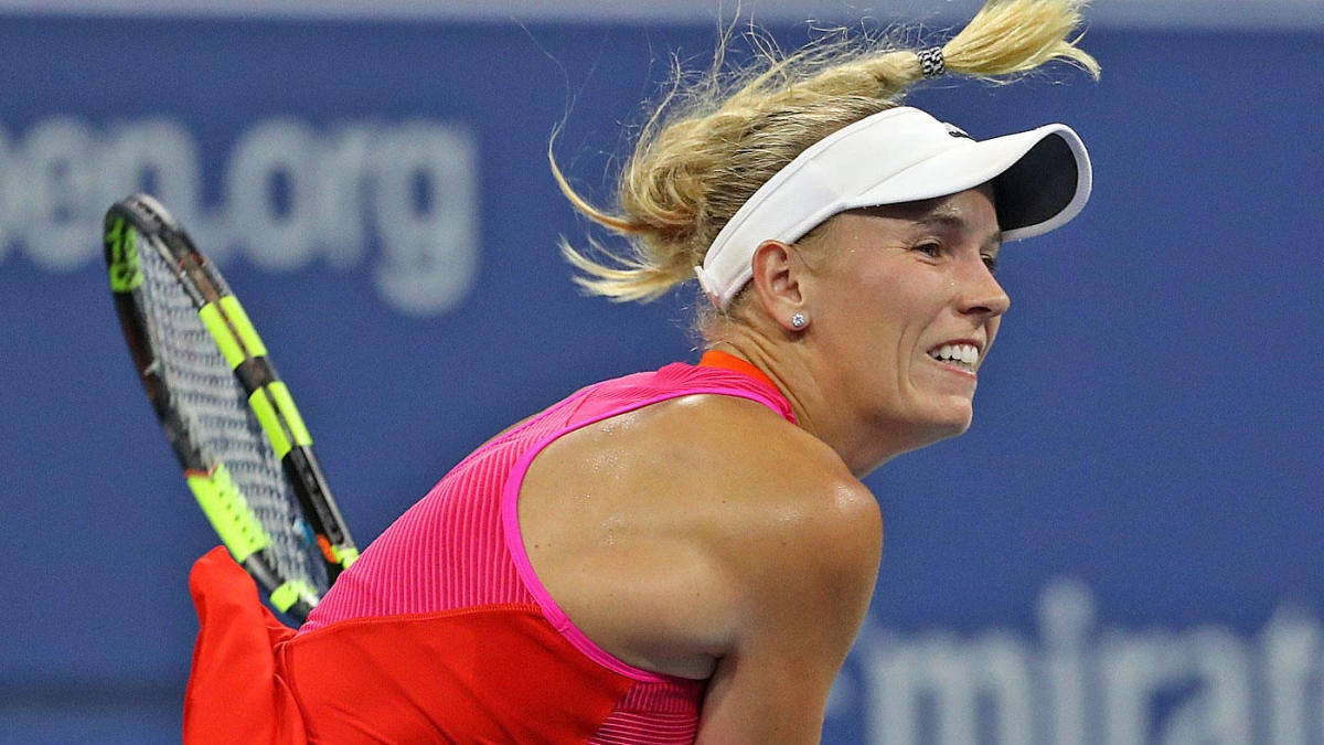 Tennis Star Caroline Wozniacki In Mid-match Action Background