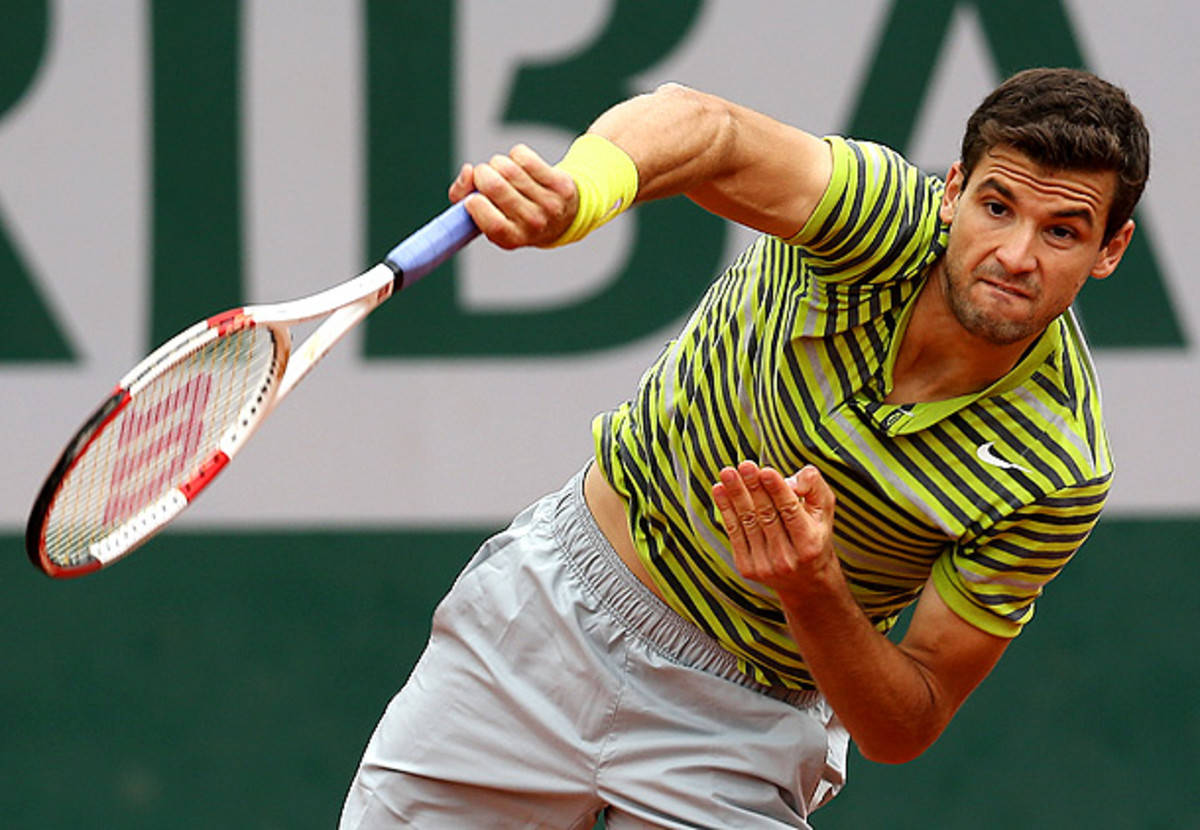 Tennis Star Grigor Dimitrov Looking Vibrant In Neon Striped Shirt Background