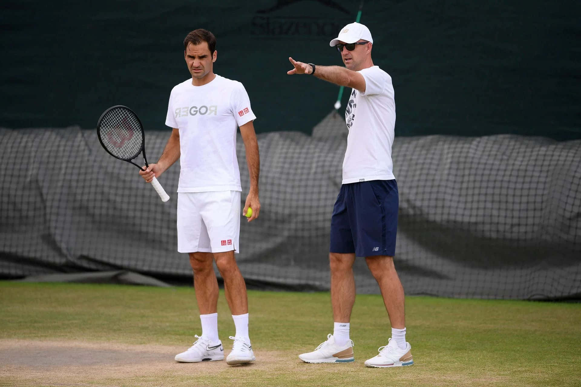 Tennis Training Sessionon Grass Court Background