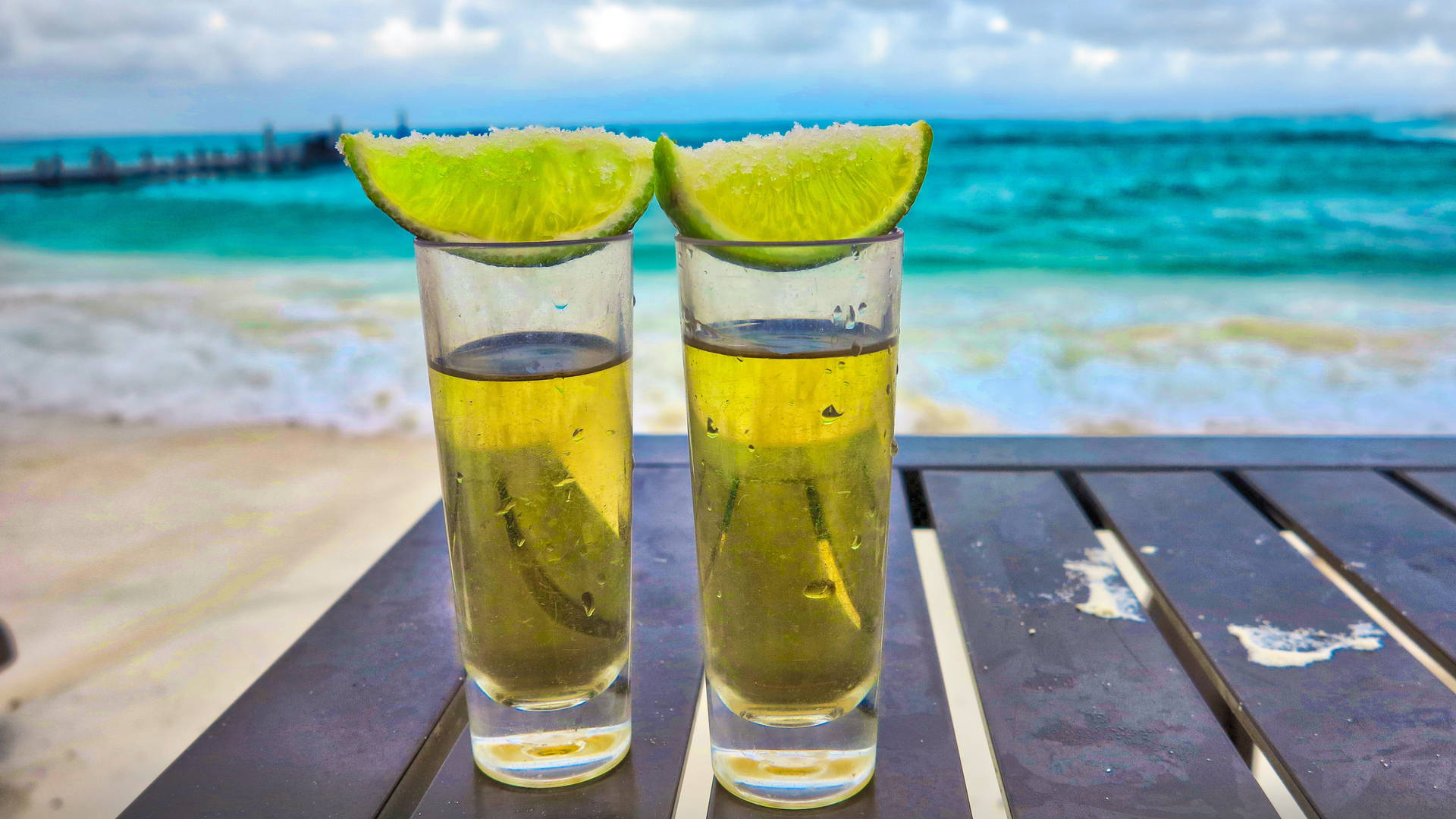 Tequila Cocktails On The Summer Beach Background