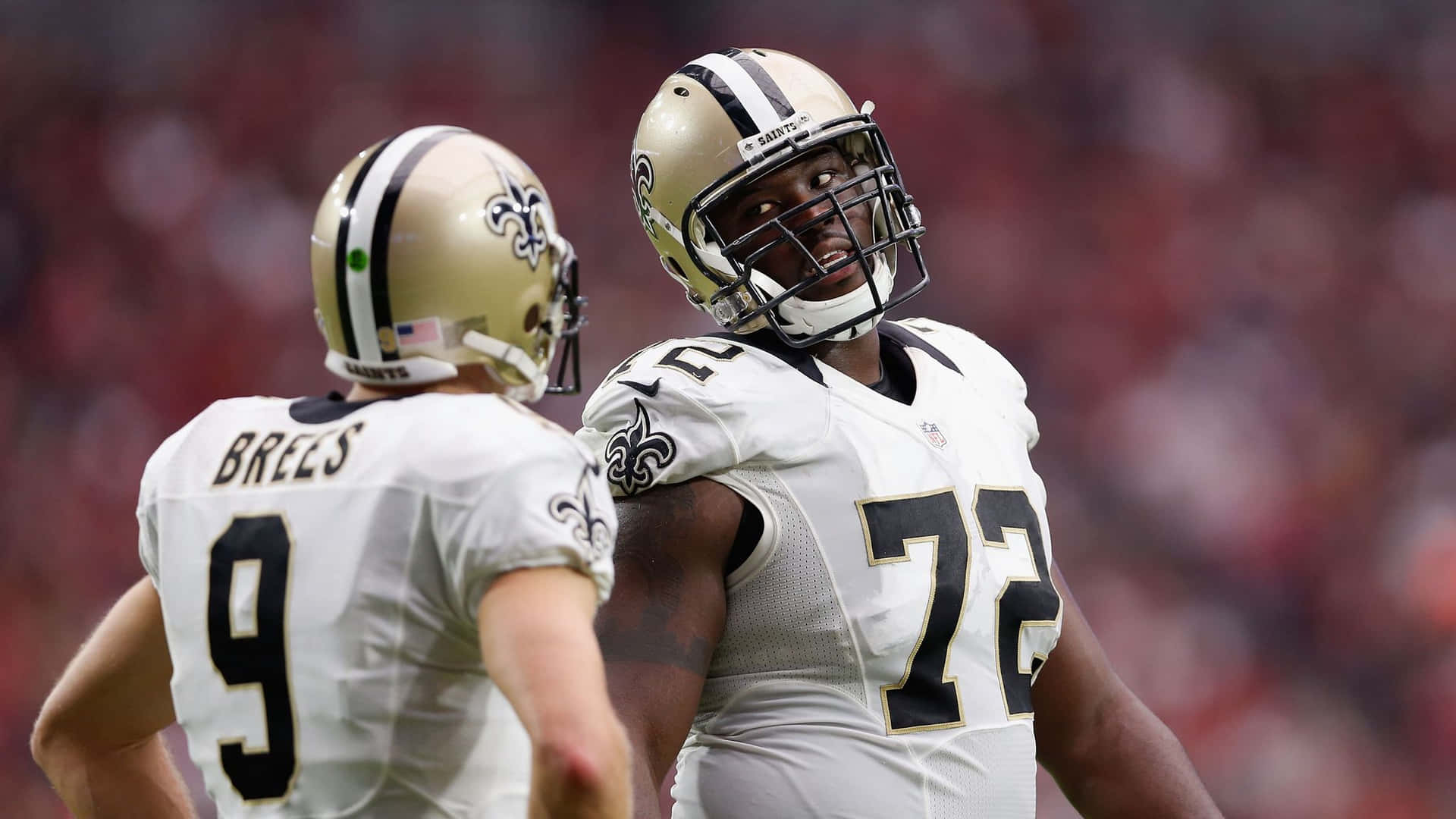 Terron Armstead With Drew Brees Background