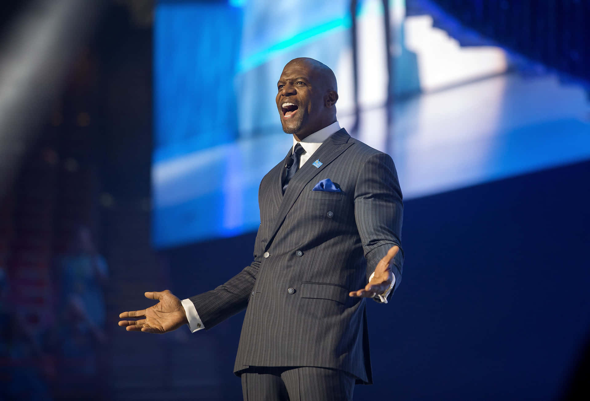 Terry Crews Radiates Positivity In A Checkered Shirt. Background