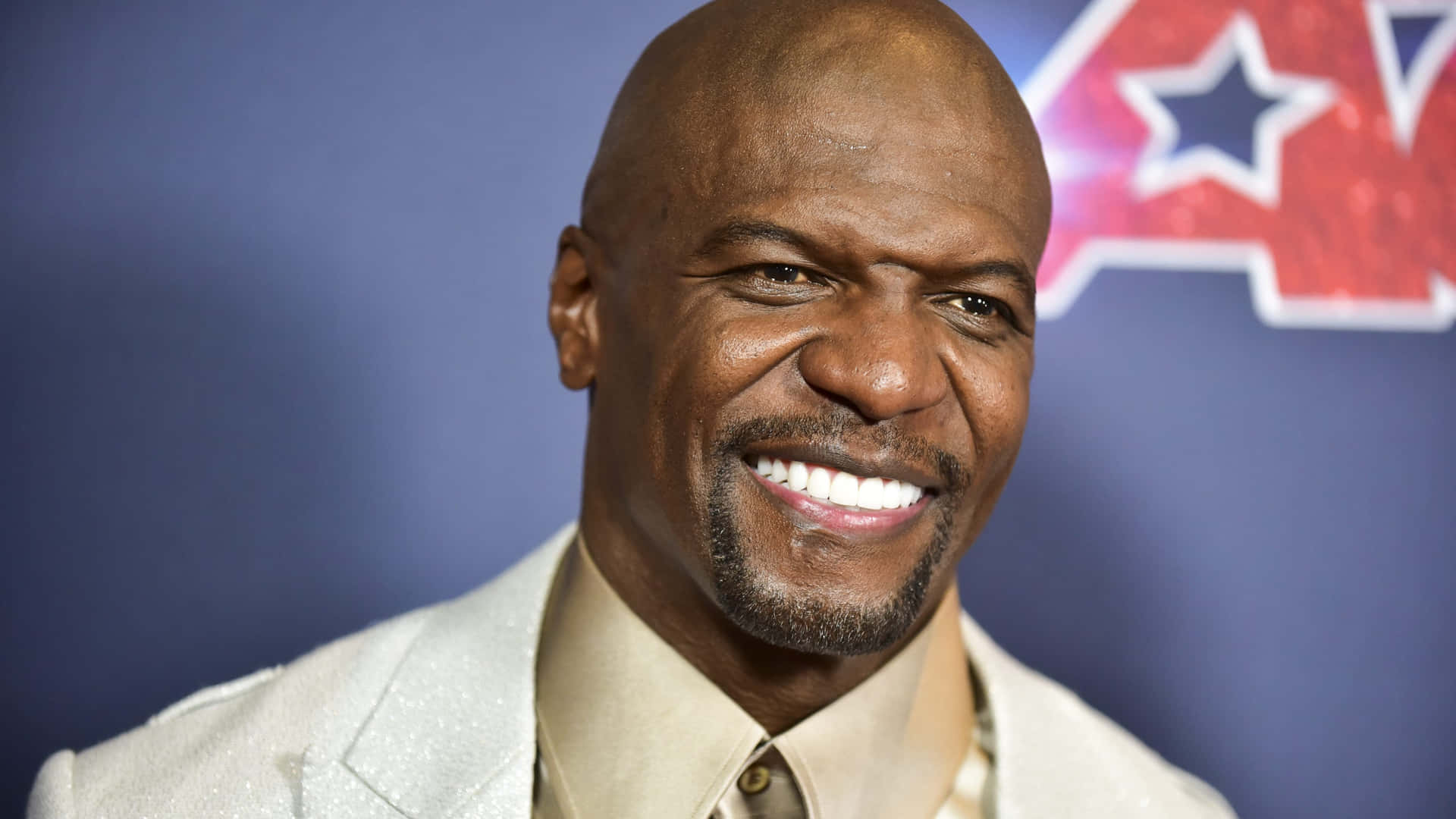 Terry Crews Showing Strength And Determination Background