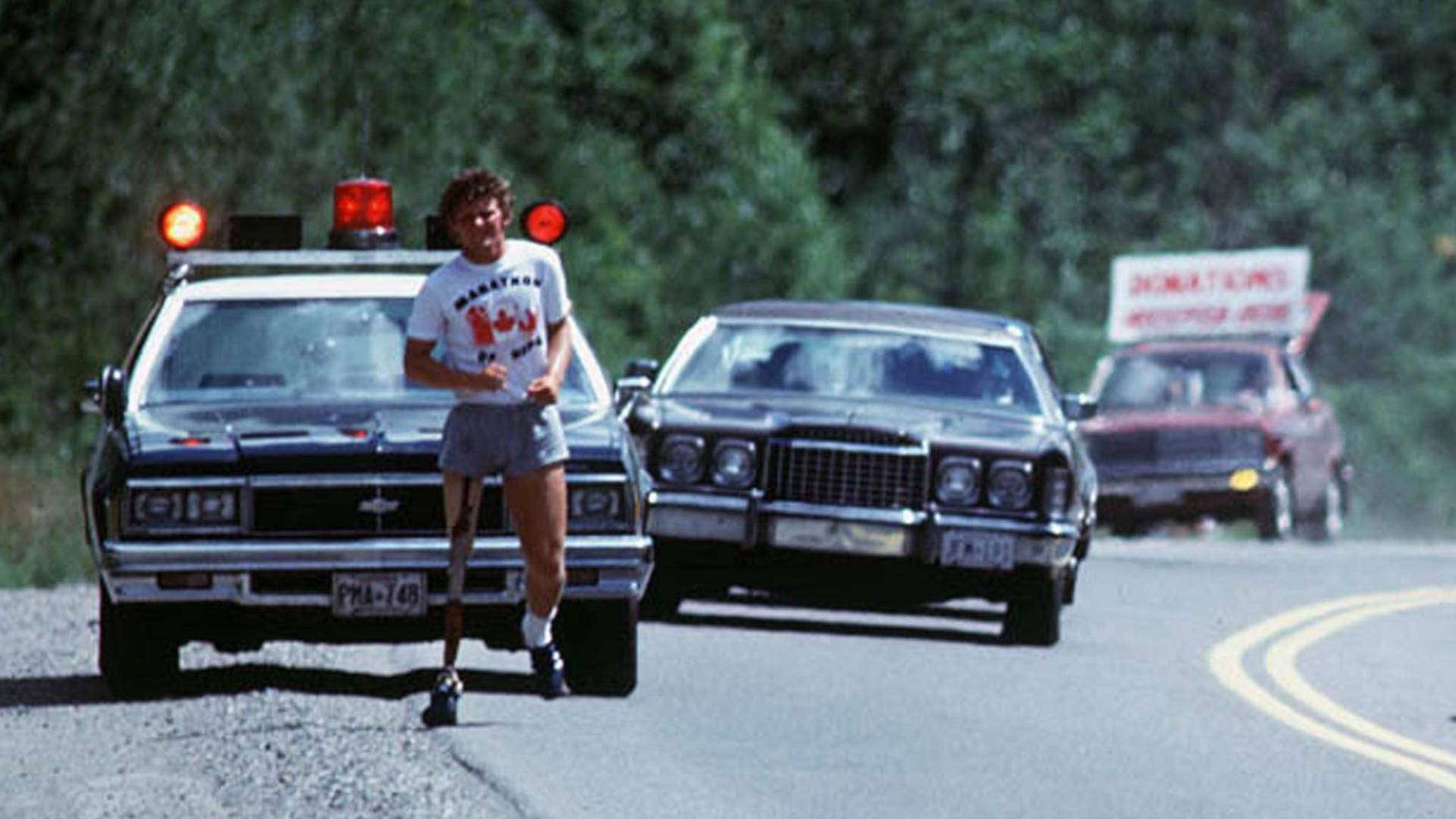 Terry Fox With Cars Background