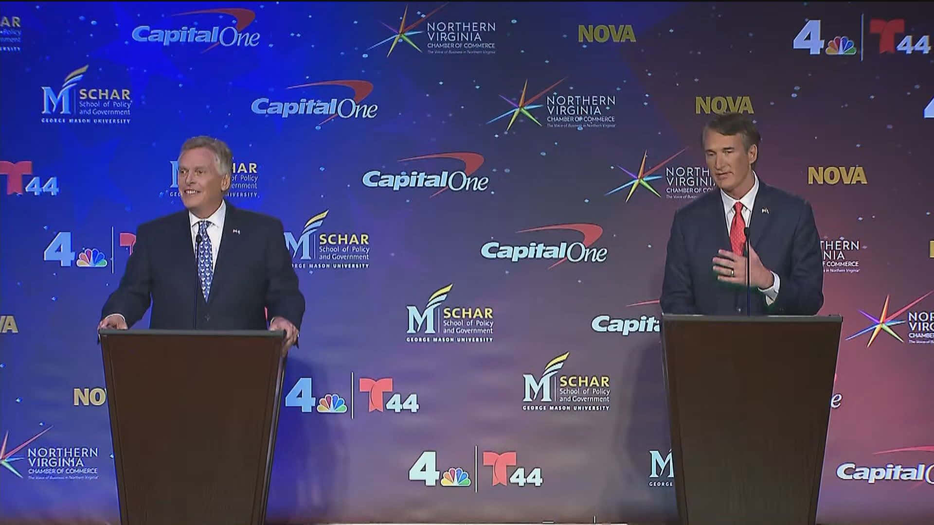 Terry Mcauliffe And Glenn Youngkin On Podiums Background