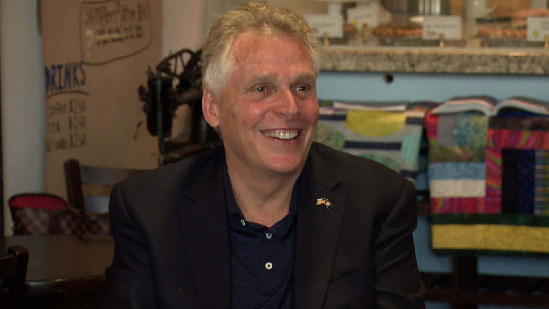 Terry Mcauliffe In A Dark Colored Blazer Background