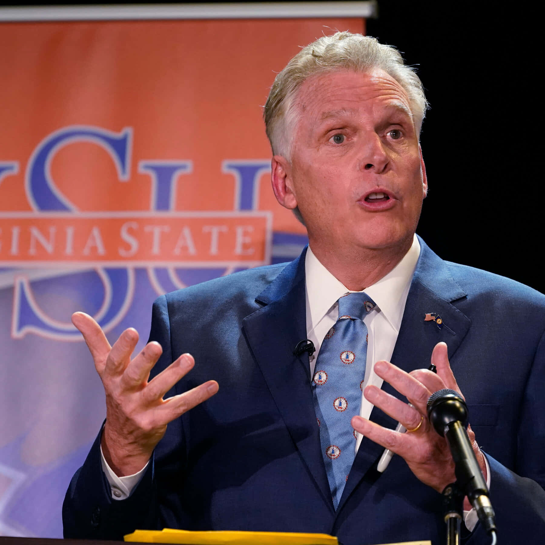 Terry Mcauliffe Speaking At Virginia State University Background
