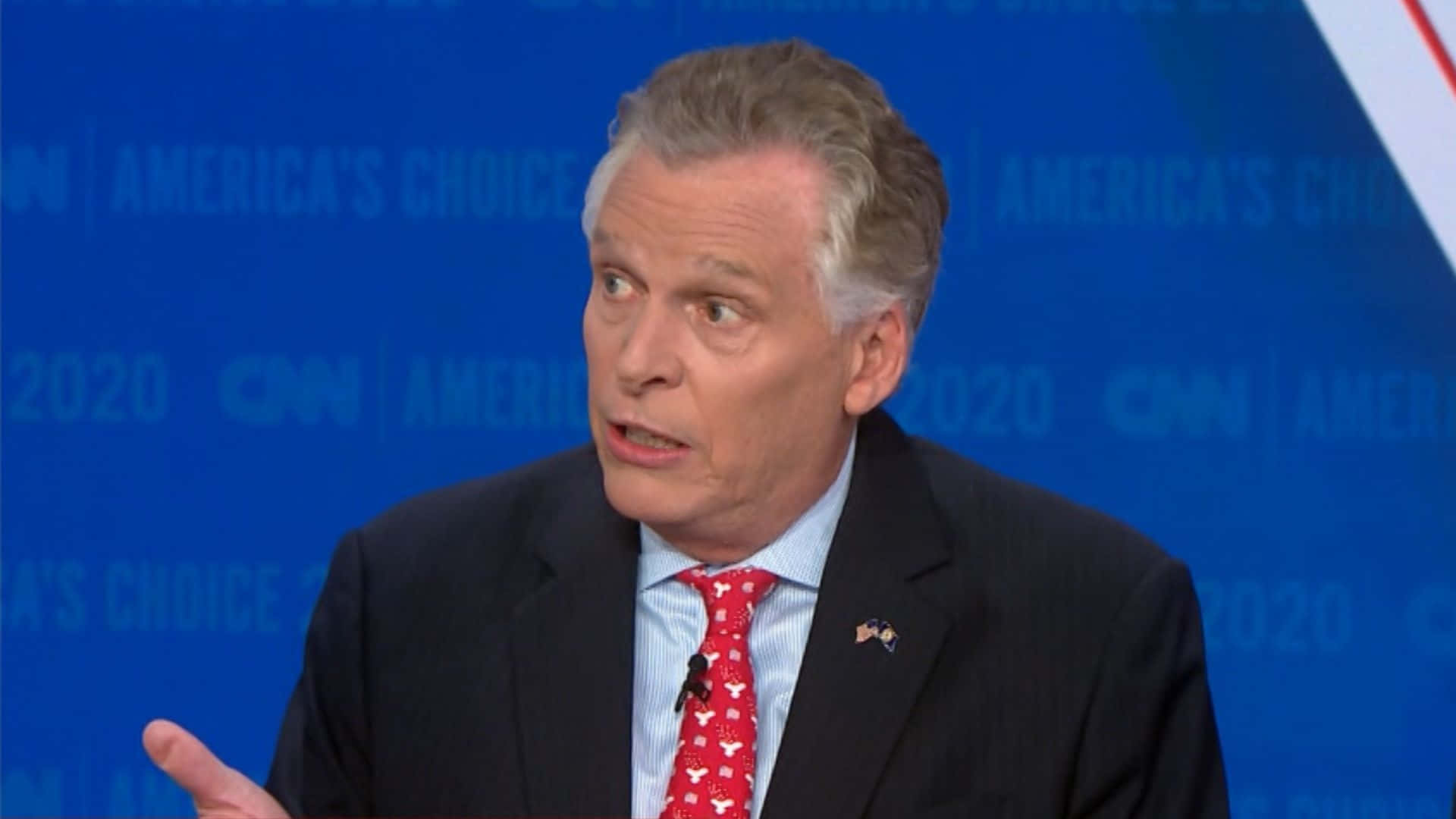 Terry Mcauliffe With Blue Cnn Background Background