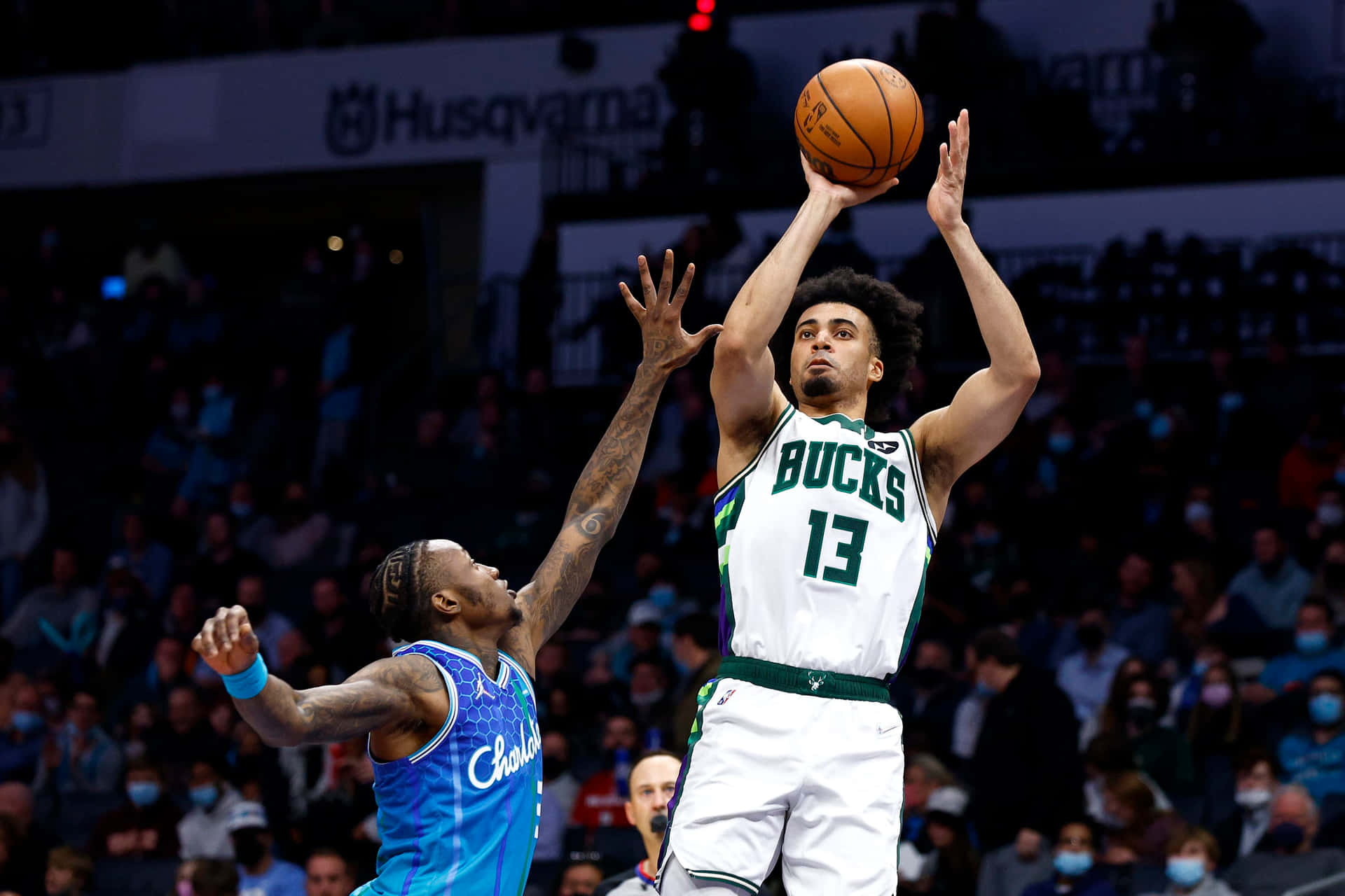 Terry Rozier Defending Charlotte Hornets Background