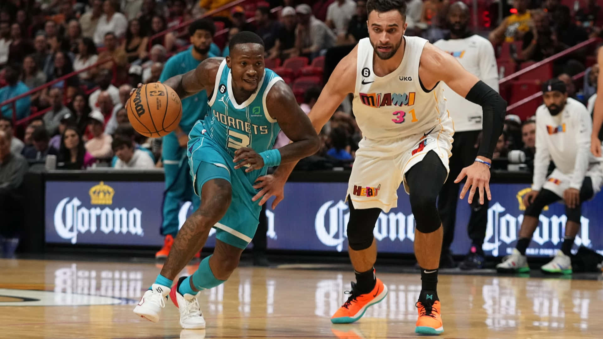 Terry Rozier Driving Charlotte Hornets Background
