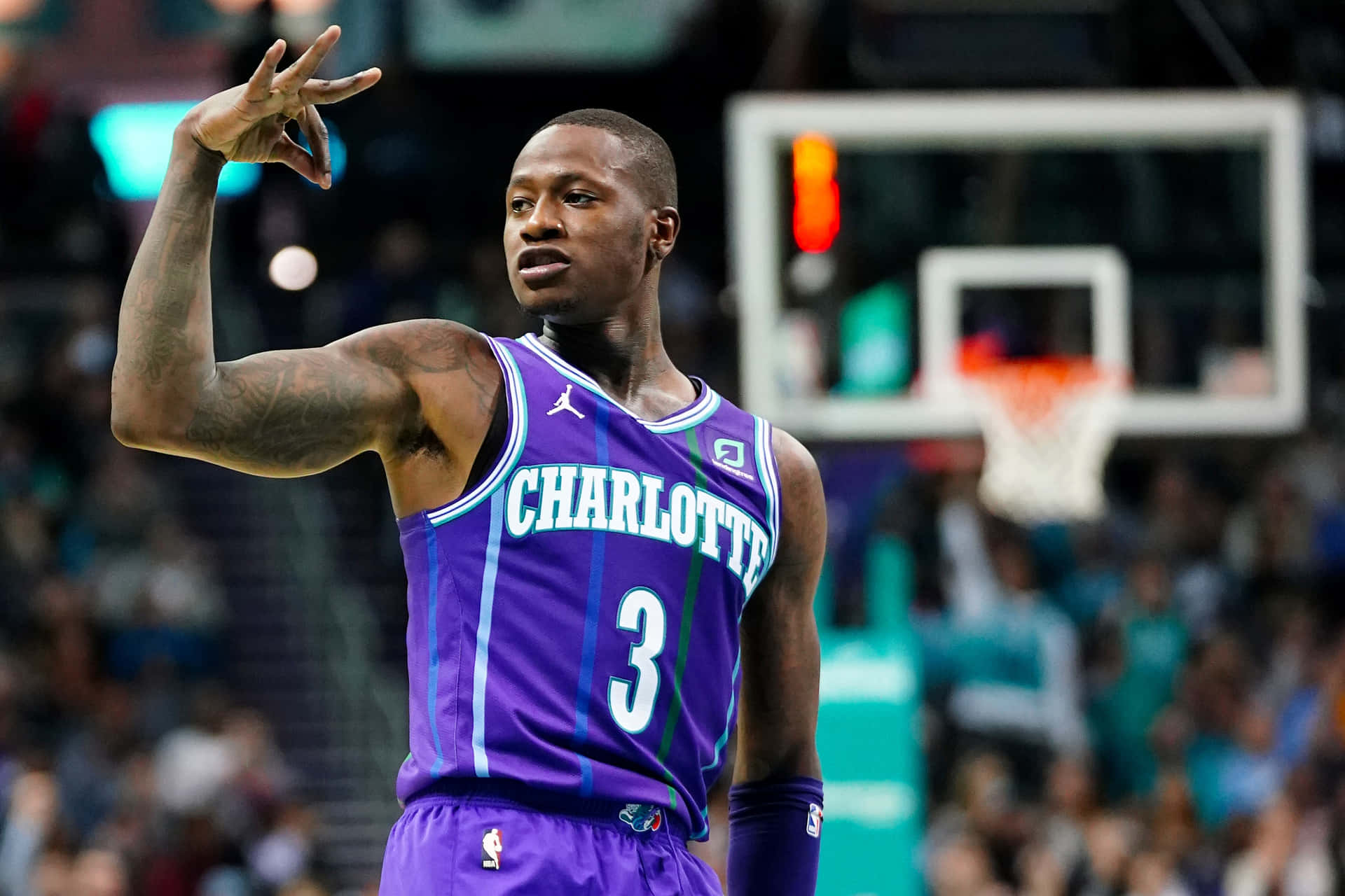 Terry Rozier Three Hand Sign Background