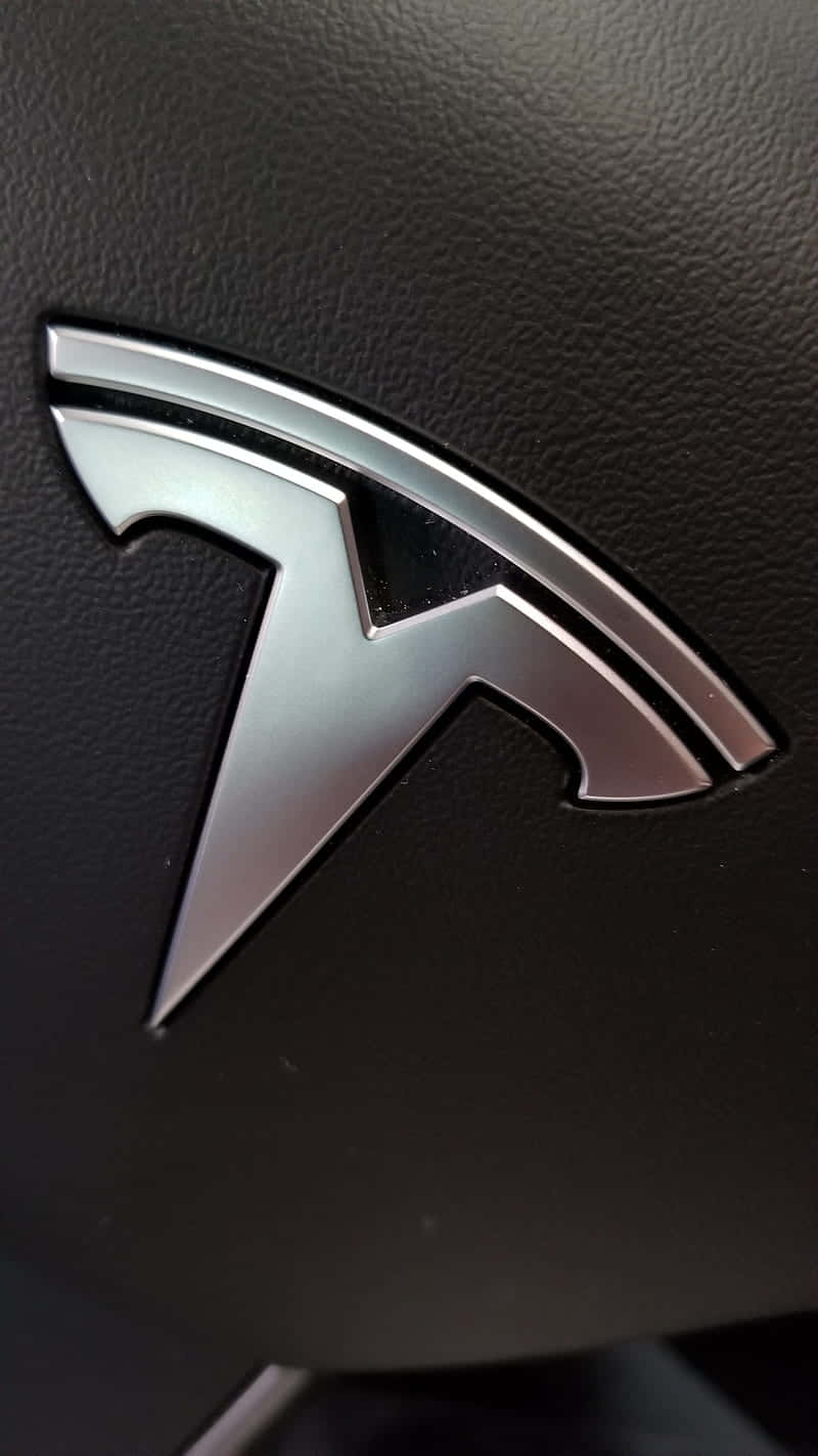 Tesla Logo In Bold White And Red