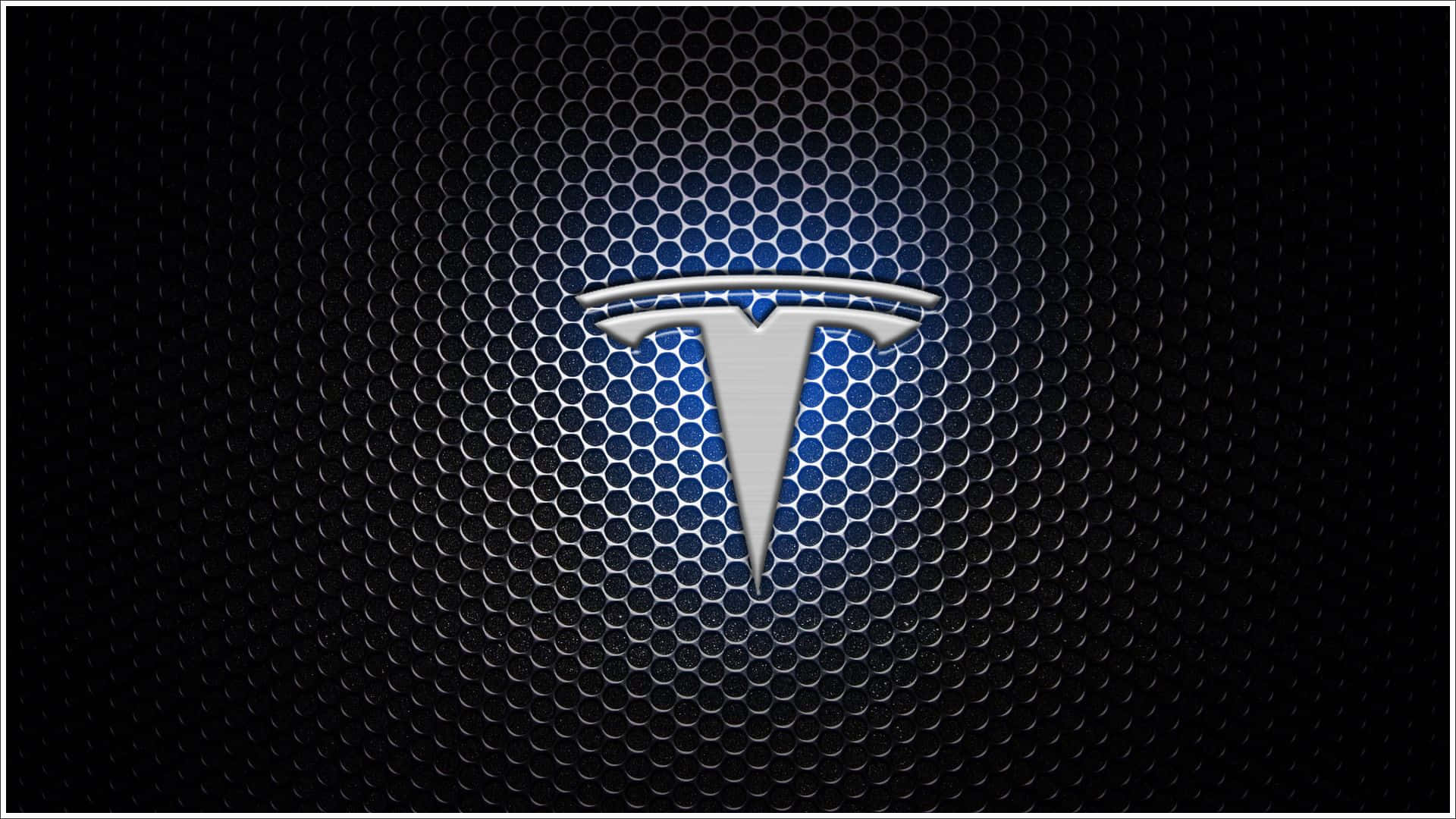 Tesla Logo On A Black Background Background