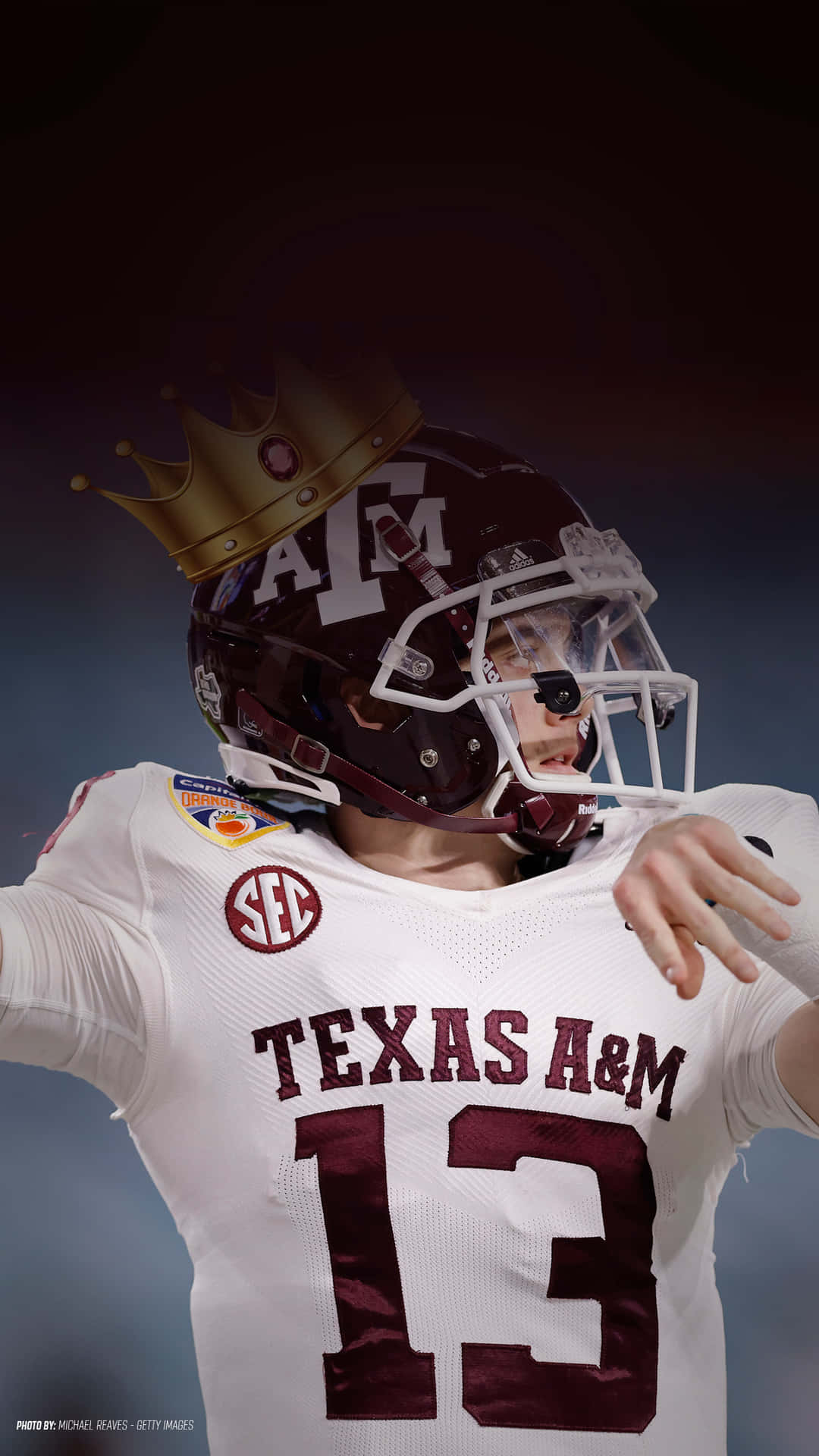 Texas Am Football Player With A Crown On His Head Background