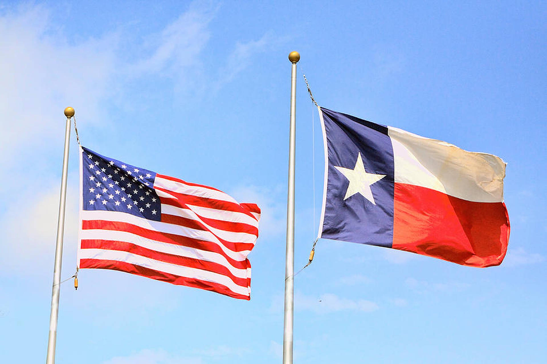 Texas Flag On Pole Background