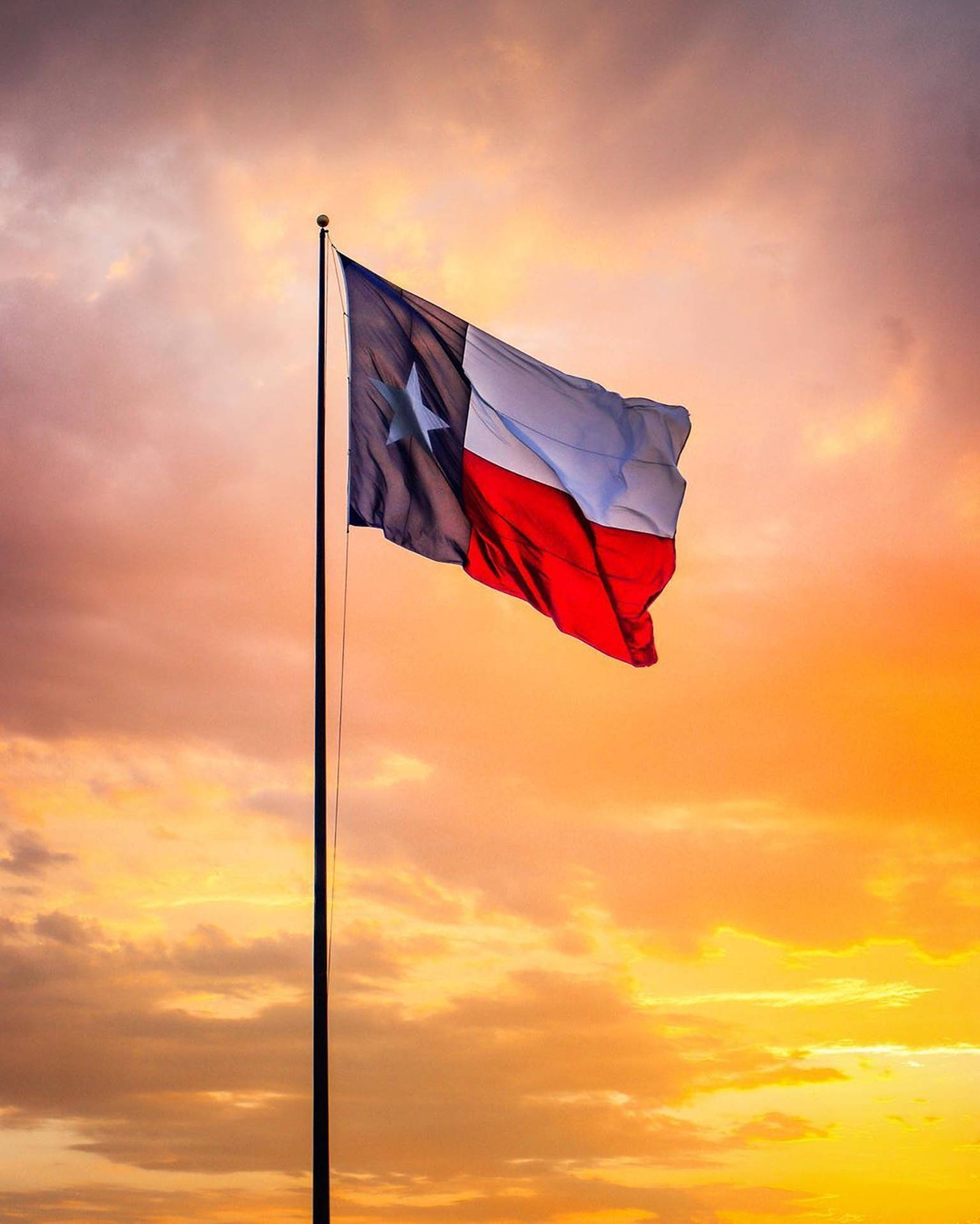Texas Flag With Sunset Background