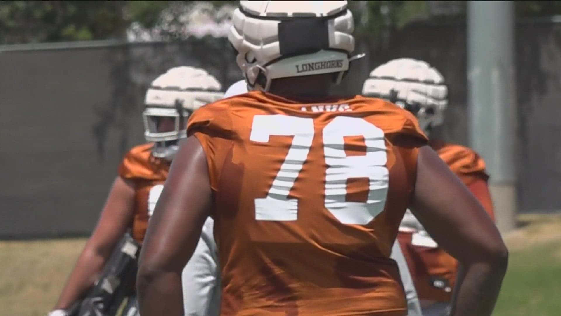 Texas Football Facing Others Background