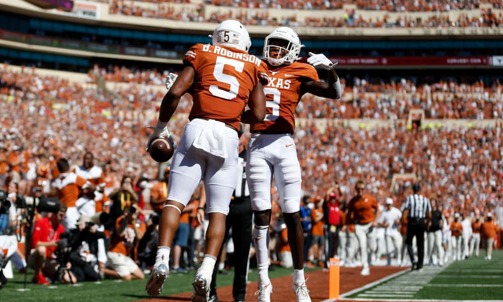 Texas Football Spreading Arms Background