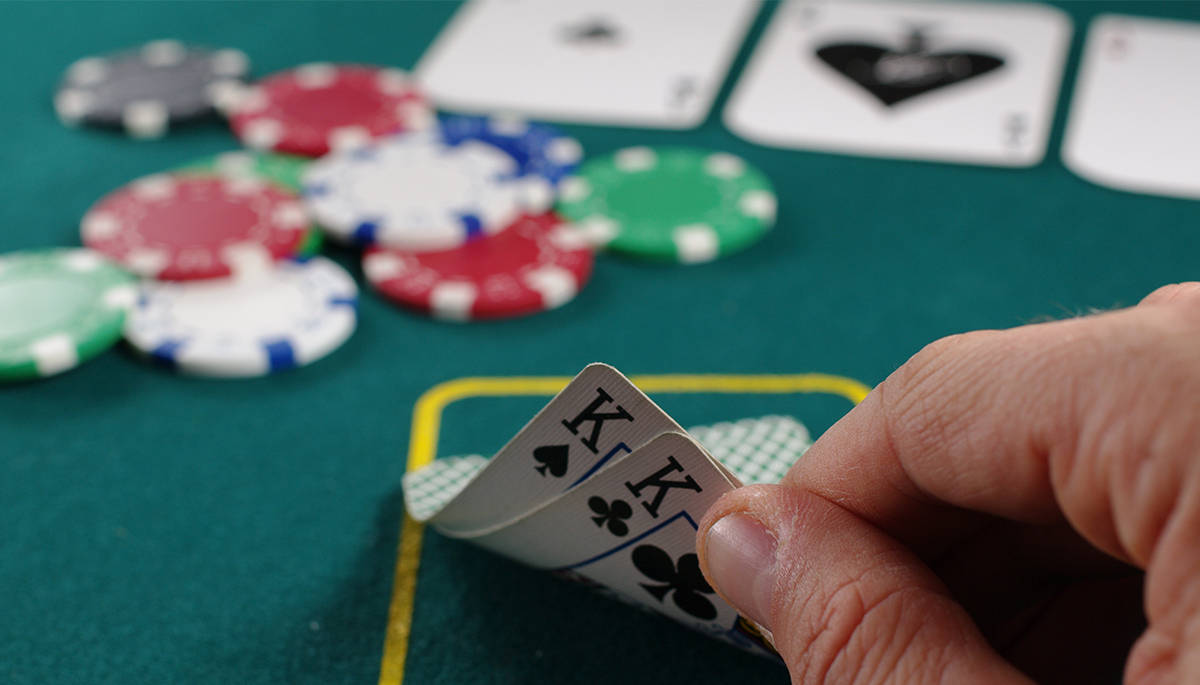 Texas Hold'em Kings On Table Background