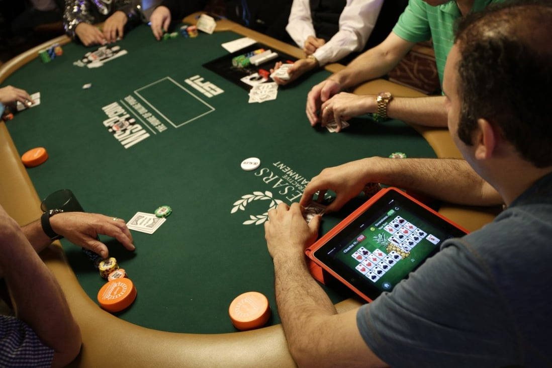 Texas Hold'em Player Engrossed In Online Game