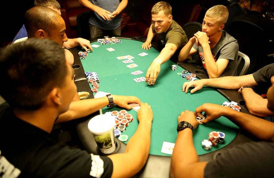 Texas Hold'em Players Making Bets Background