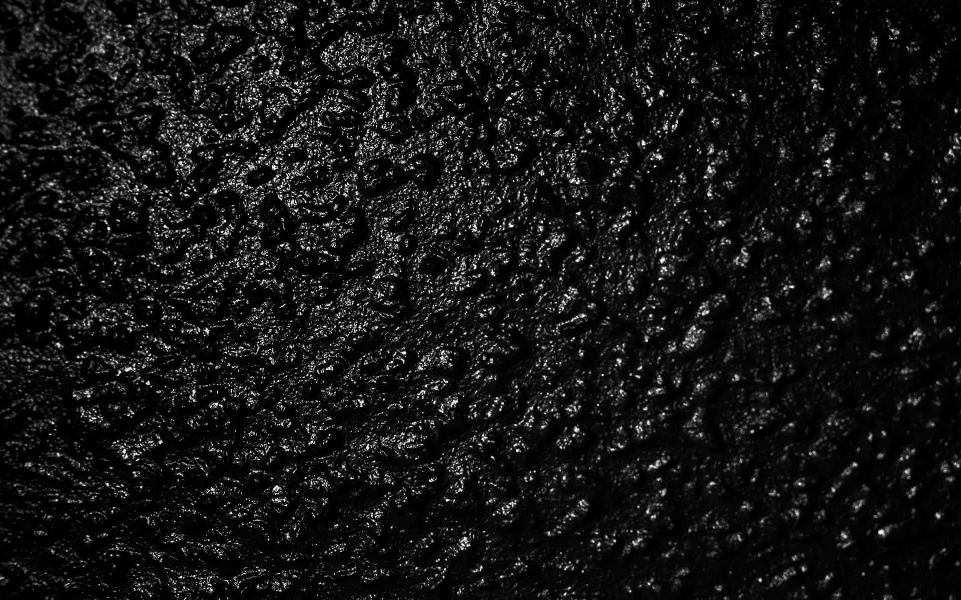 Textured Black Surface Abstract Background